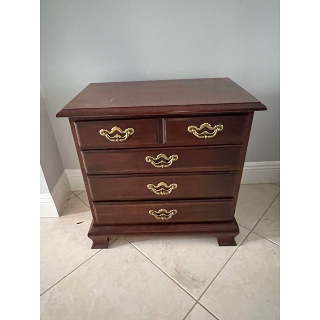 This Thomasville Chippendale style nightstand is from the Collectors Cherry Collection and is made of cherry wood with...