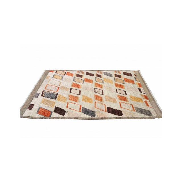 Hand knotted unique rug newly made in Afghanistan using hand spun wool.