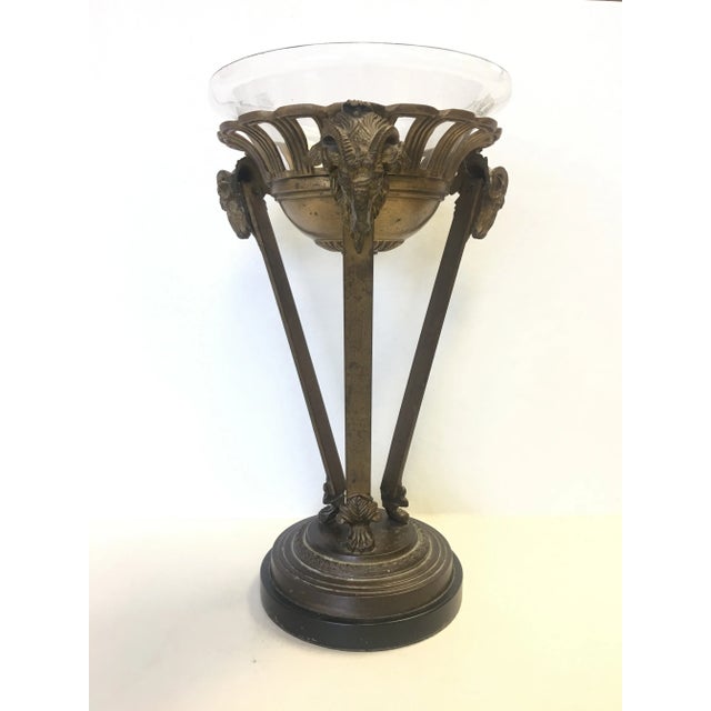 Timeless vintage brass rams head pedestal stand with glass bowl insert. There's a rich patina to the brass adding to its...