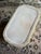 Vintage mid-century yellow porcelain wastebasket. Pattern looks like button tufting. Has a crack on top rim that doesn’t...