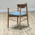 This mid-century modern armchair, handcrafted in Denmark , features a beautifully sculptural frame made from solid elm...