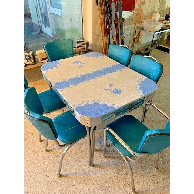 This original 1950s diner table with six chairs and an extension leaf from the USA Original 1950s diner kitchen table from...