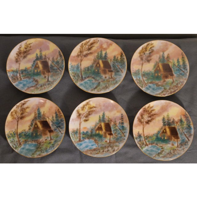 Up for sale is a Set of 6 Circa 1900 American Impressionist Style Forest Cabin Landscape Motif Painted Porcelain Gilded...