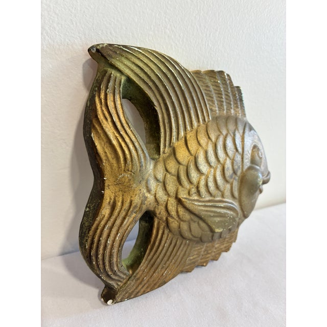 Whimsical vintage gold painted plaster fish plaque with realistic scales and fin details. Can be used as wall art or a...