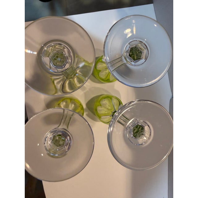 Set of four cordial glasses made by Baccarat in the Genova pattern. Two green and two chartreuse, both highly collectible....