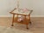 A wonderful serving cart from the 1950s. High-quality solid beech frame stained in teak, with a cream-white tile-covered...