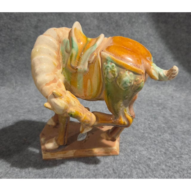 Add a touch of timeless elegance to your home with this striking collection of three Tang Dynasty-style ceramic war...