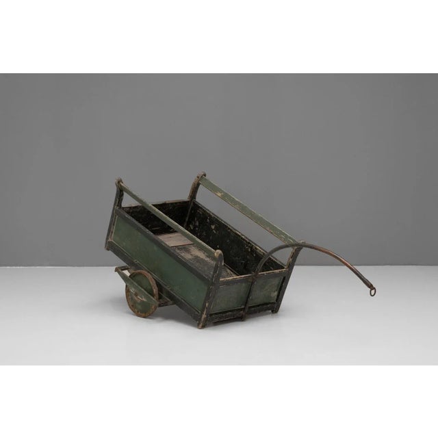 Bicycle cart in original green paint. Circa 1900.