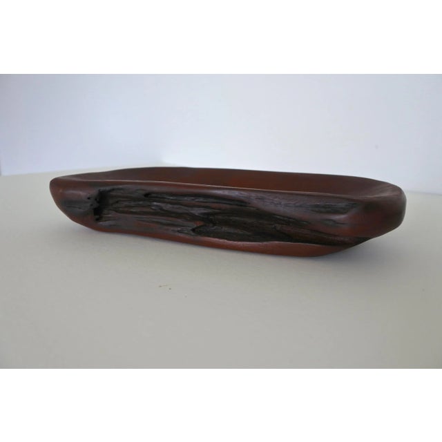 Hand carved studio wood dish. Solid mahogany. In the manner of Alexandre Noll. Made in France in the 1950s.
