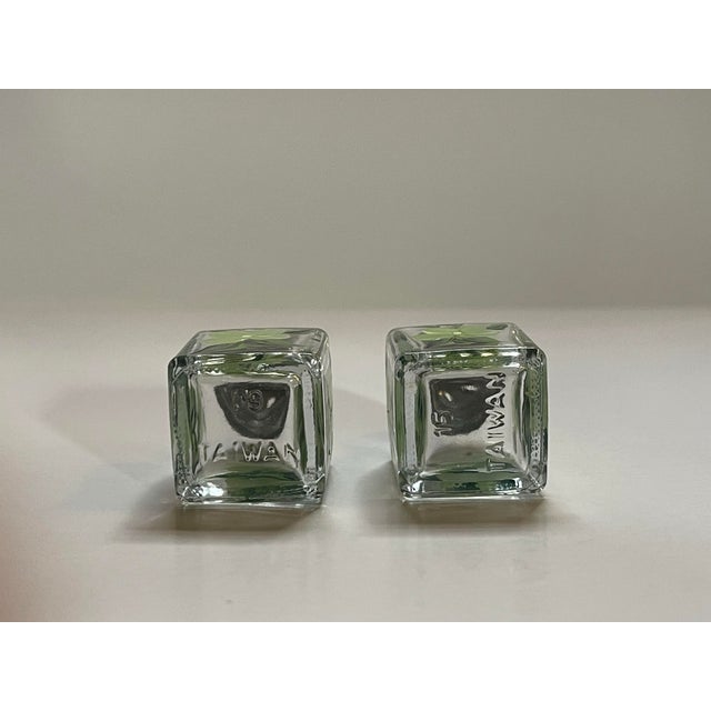 A pair of hand painted floral salt & pepper shakers with an impressionist inspired pale green blossom, darker green leaves...