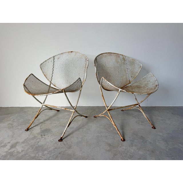 A striking pair of 1960’s vintage “Clamshell” or “Orange Slice” patio chairs designed by Maurizio Tempestini for John B....
