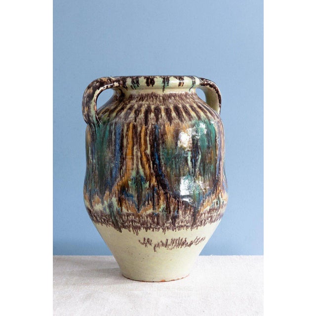 This early 20th-century glazed earthenware jar comes from the workshop of Pierre de Verclos in Nabeul, Tunisia. It...