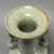 This elegant antique Chinese celadon vase is decorated with twin phoenix ears and covered with fine crackle glaze. Crafted...