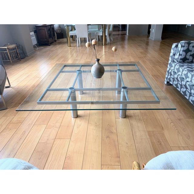 Amazing statement piece from the 70’s. Glass corners have a flat edge instead of pointed. Heavy glass sits on top of the...