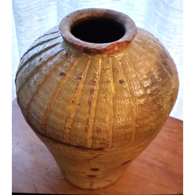 These vessels share a distinct aesthetic with traditional Japanese folk art (Mingei), featuring rustic finishes and...