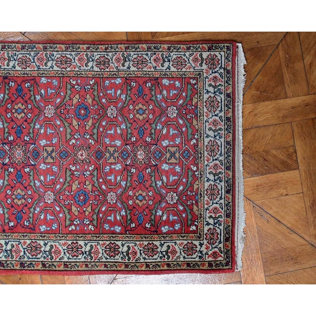 Hand-knotted rug with heraty pattern. Wool pile on cotton warp. Weaving density around 90,000 knots per m2. Condition:...