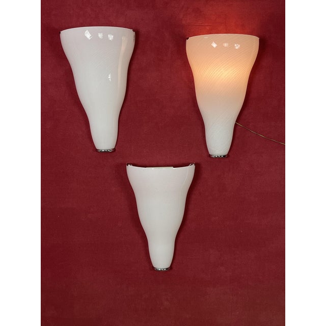 Set of 3 large Murano glass wall lamps Leucos, 1980s Metal structure, E27 lamp Intact and in good condition. Height 49 cm....