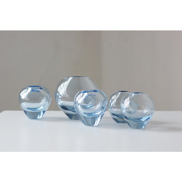 A collection of five Rondo Aqua vases designed by Per Lütken and produced by the renowned Danish glassworks Holmegaard....