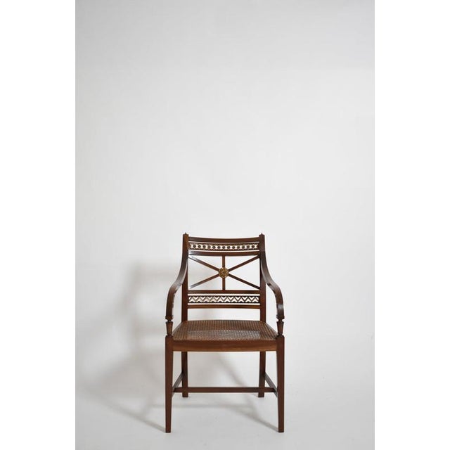 Pair of neoclassical mahogany and canning armchairs, XIXth c. Height: 90 cm - 35.43 in Length: 55 cm - 21.65 in Width: 56...
