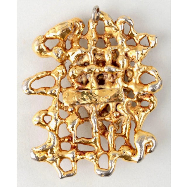 IBRAM LASSAW (Russian-American, 1913-2003), Sculptural pendant Gold plated bronze Signed verso Measurements: 2-7/8''h,...