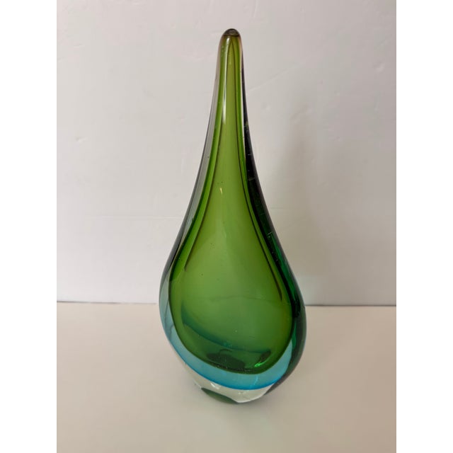 Beautiful mid-century solid glass sommerso teardrop glass object. Layered shades of green, blue and clear glass. Unmarked...