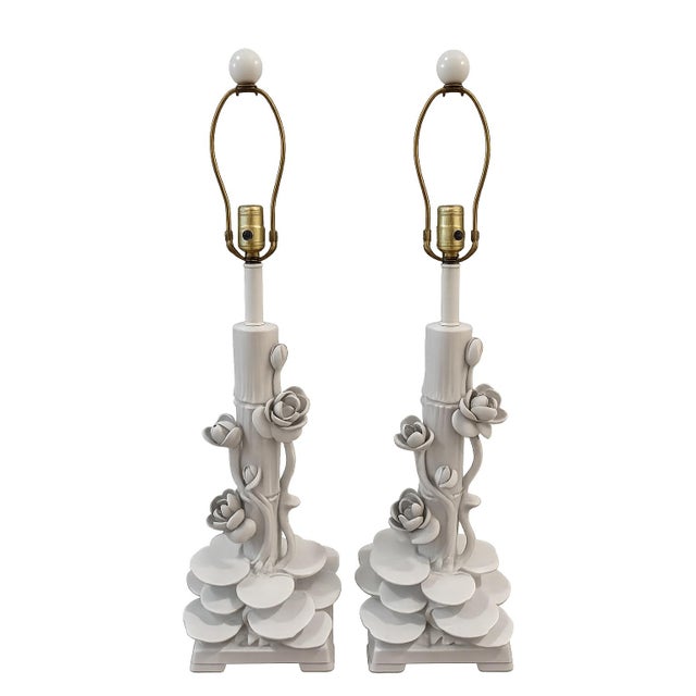 An exceptional pair of Serge Roche Style vintage Italian white ceramic table lamps featuring sculptural faux bamboo stems...