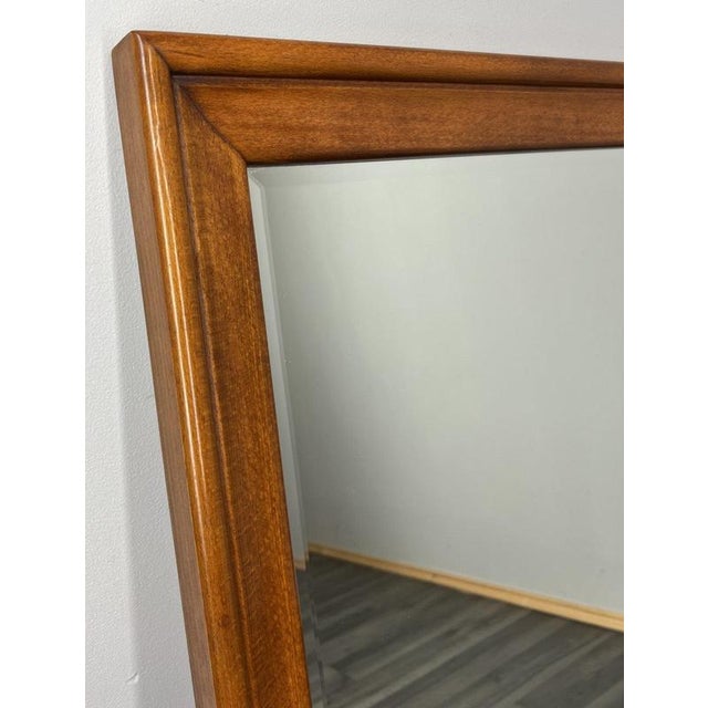 This elegant Vintage French mirror features a clean, refined frame with warm polished tones, offering a simple yet stylish...