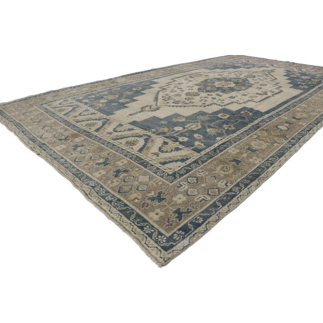 53657 Vintage Turkish Oushak Rug 05'09 x 10'06. This exquisite hand-knotted wool vintage Turkish Oushak rug marries Mid-...