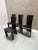 Meet the Postmodern Brutalist Pietro Costantini Dining Chairs. This striking set of four chairs combines sculptural...