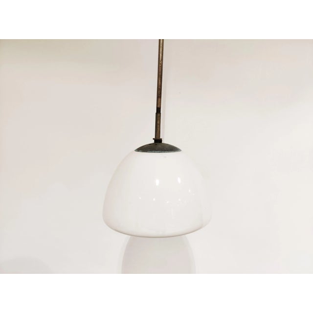 Vintage Opaline Pendant Lamp, 1930s, in Good conditions. Designed 1920 to 1949 Up to 250V (Europe/UK Standard).The wiring...