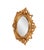 Finished in a luxurious antique gold, the ornate frame adds a touch of classic sophistication, making it a perfect accent...