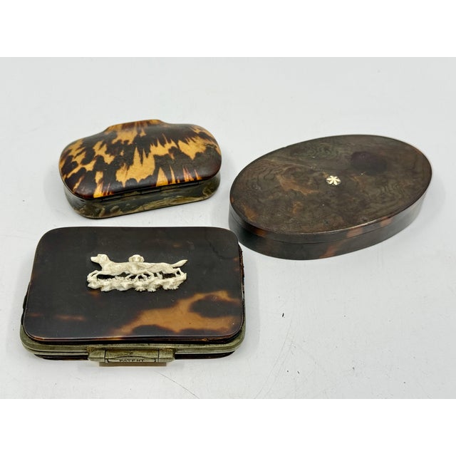 A set of 3 Horn boxes descended in the same New England family. These three consist of a snuff box, a change purse and a...