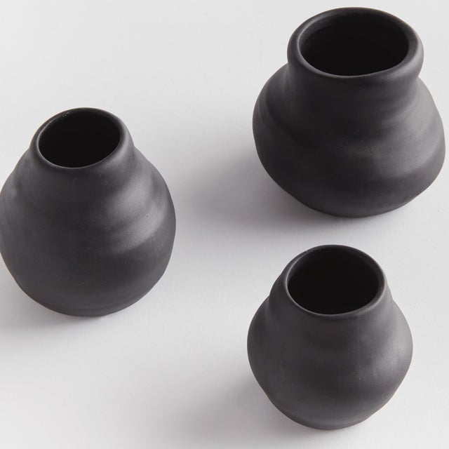 With a matte black glaze, imperfect texture and basic form, these three bud vases are simple and raw. A freshly made...
