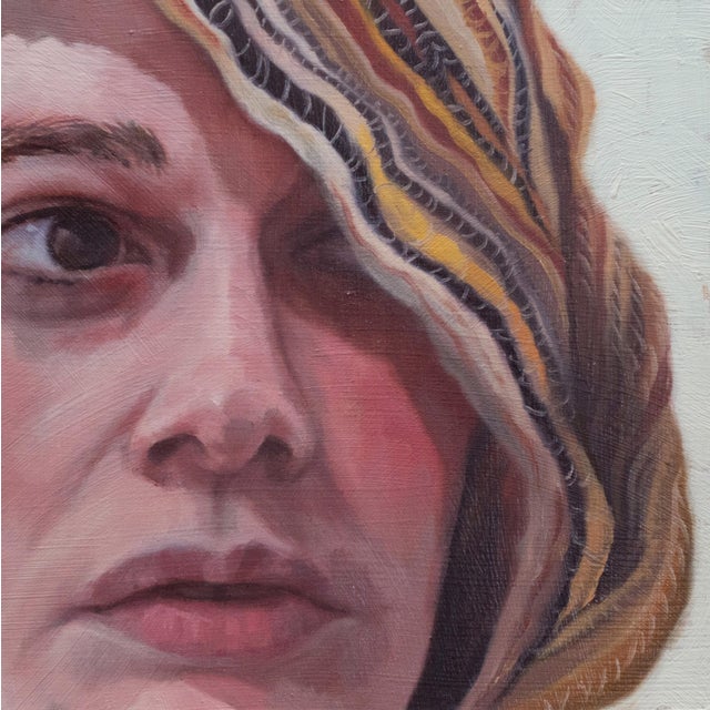 The Sun's Shade presents a close-up view of a figure whose gaze is both introspective and inviting. The use of oil on wood...