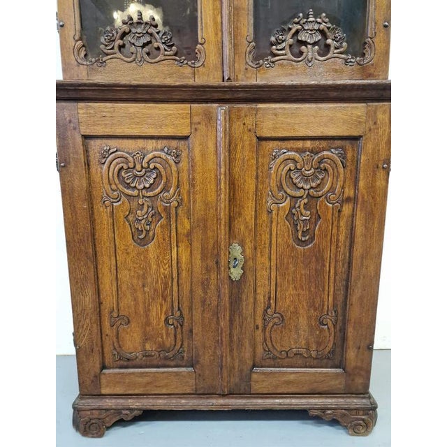 Antique 18th century display caseOak.France.Not dismountable.Dimensions: height 210cm; width 102cm; depth 40cm