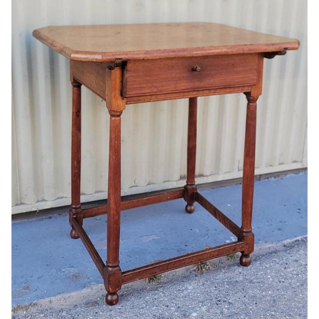 This fine 18thc walnut tavern table with the original drawer and hardware pull.The condition is very good on this New...
