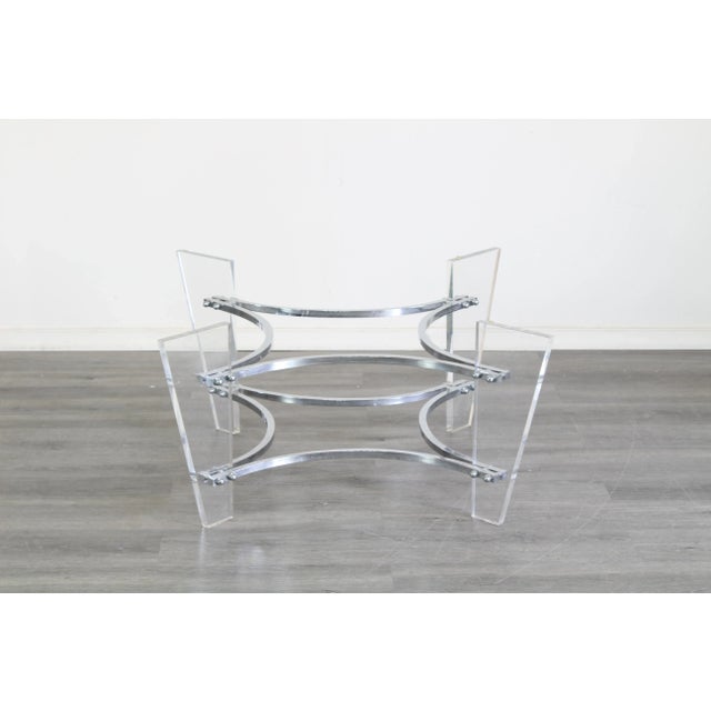 Vintage Lucite and chrome coffee table with glass top This table is in great vintage condition The metal has minor wear,...