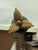 The Gran Tour Style Metal Tall French Empire Neo-Classical Obelisk Statuette is a stunning decorative piece inspired by...