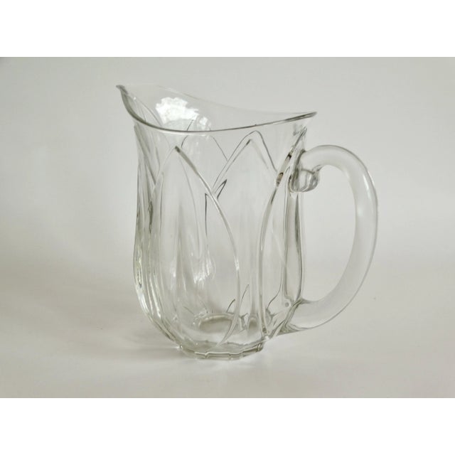 Mid Century large mouth crystal glass water pitcher marked 'France' on reverse. It is a nice big size and heavy, weighing...