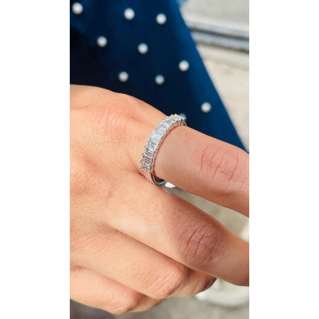 An 18K gold half eternity band set with diamonds represents a couple's unending love. It demonstrates your unending love...