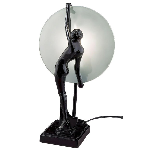 Art Deco-styled Frankart re-edition by Sarsparilla features a nude nymph silhouette moon black metal table lamp. This lamp...