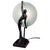Art Deco-styled Frankart re-edition by Sarsparilla features a nude nymph silhouette moon black metal table lamp. This lamp...