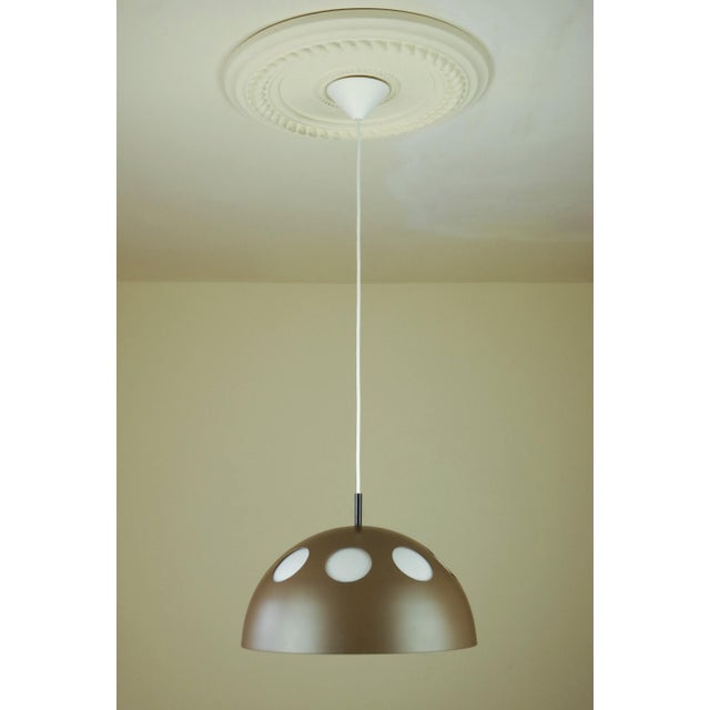 The el duomo pendant lamp, designed in 1968 and produced by raak amsterdam, is a refined example of late 1960s dutch space...