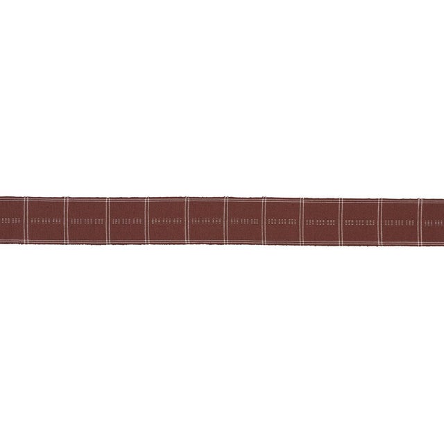 A cotton-linen trim woven on a traditional needle loom, Ayan Tape features a rectilinear plaid with delicate linework and...