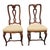 Pair of authentic 18th century Italian walnut chairs with their original finish and hand-carved details. Each chair...