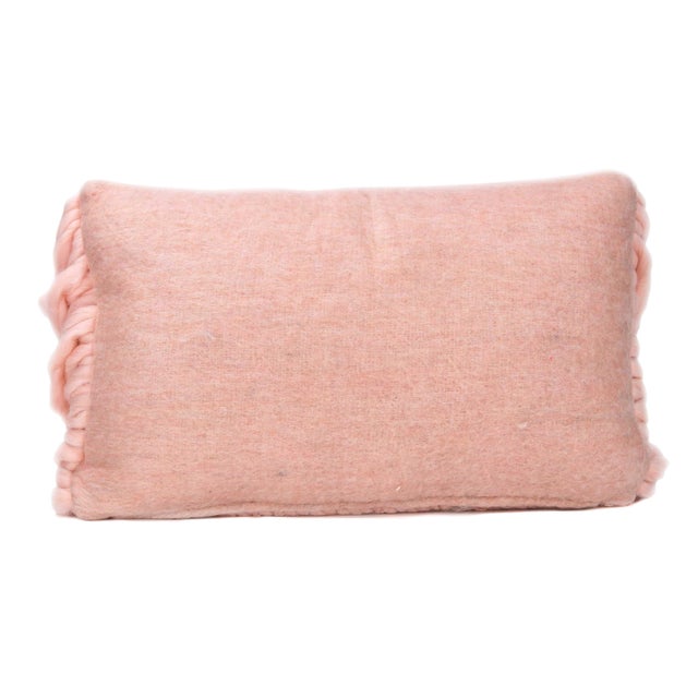 Luxuriously soft, the Afrino throw pillow features a woven design complimented with its long tasseled sides. Add this...