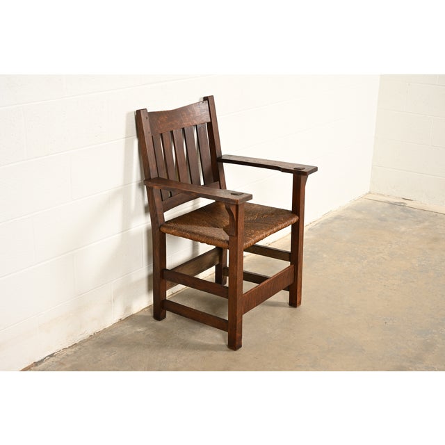 A rare and exceptional antique Mission or Arts & Crafts period armchair, club chair, or dining captain chair By Gustav...