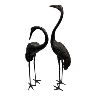 Pair of Vintage Hollywood Regency Dark Patinated Brass Crane Statues For Sale