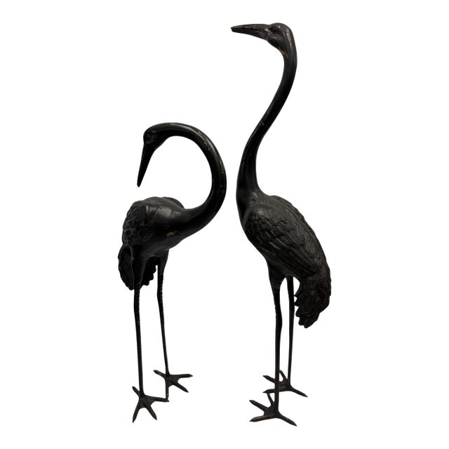 Pair of Vintage Hollywood Regency Dark Patinated Brass Crane Statues For Sale