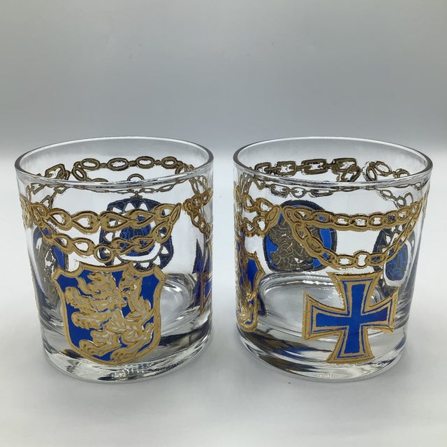 Set of 4 rare Georges Briard chain and medallion glasses. Two in red and gold and two blue and gold.